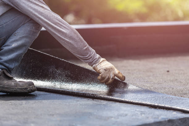 Professional Emergency Waterproofing technician working in Christiansburg, OH